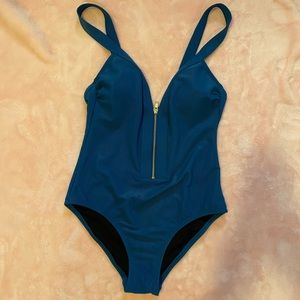 BRAND NEW. One Piece Swim Suit